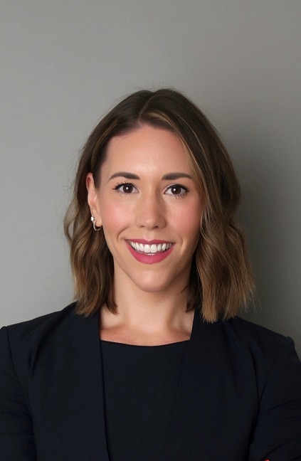 A professional headshot of Anne Shapiro