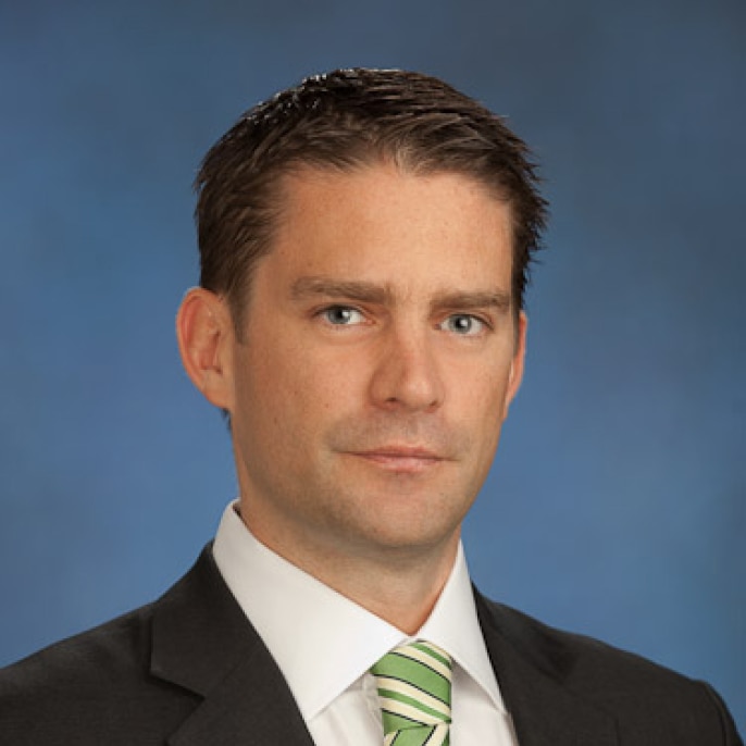 A professional headshot of Jean-Paul Churchouse