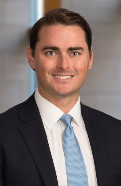 A professional headshot of Matt Doherty