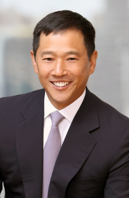 A professional headshot of Ronald Lee