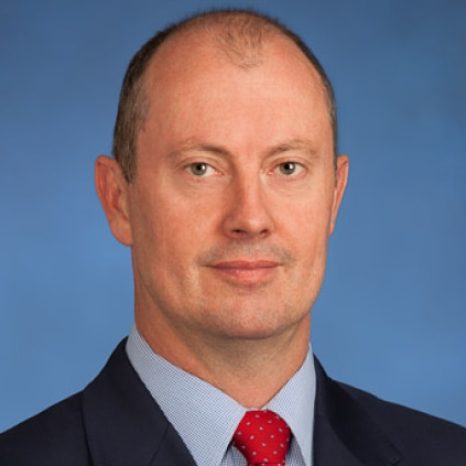 A professional headshot of Simon Osborn 