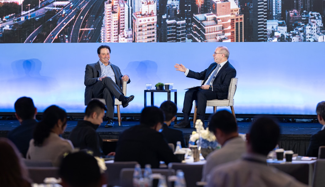 Michael Arougheti and Kevin Sneader speaking during a session on private credit at the Goldman Sachs Alternatives Investments Confererence.