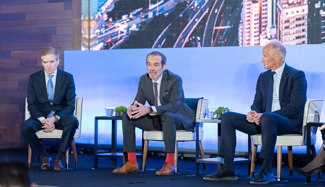 Sean Cunningham, Pontus Pettersson, and Adrian Jones speaking during a session on private equity at the Goldman Sachs Alternatives Investments Confererence.