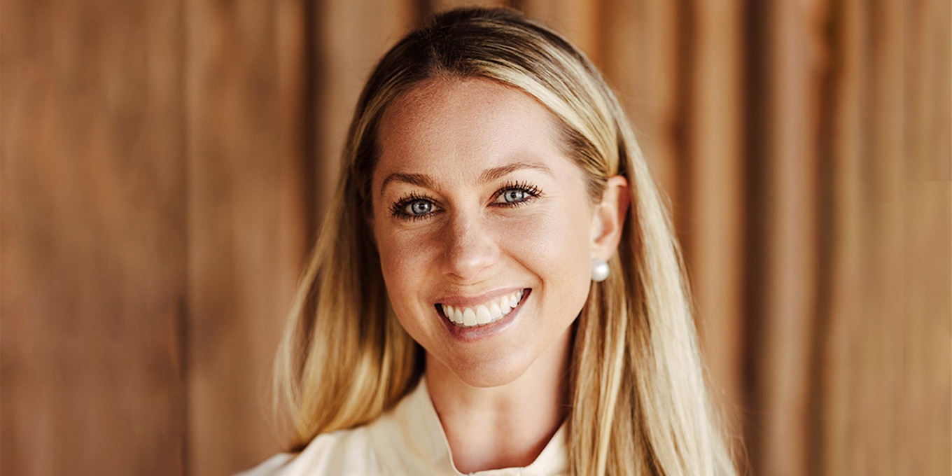 A professional headshot of Amanda Harlan