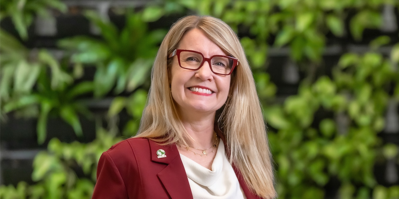 A professional headshot of Jennifer Morris.