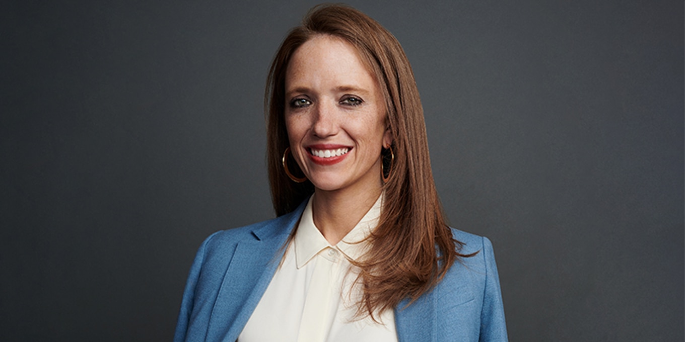 A professional headshot of Kate Ryder.