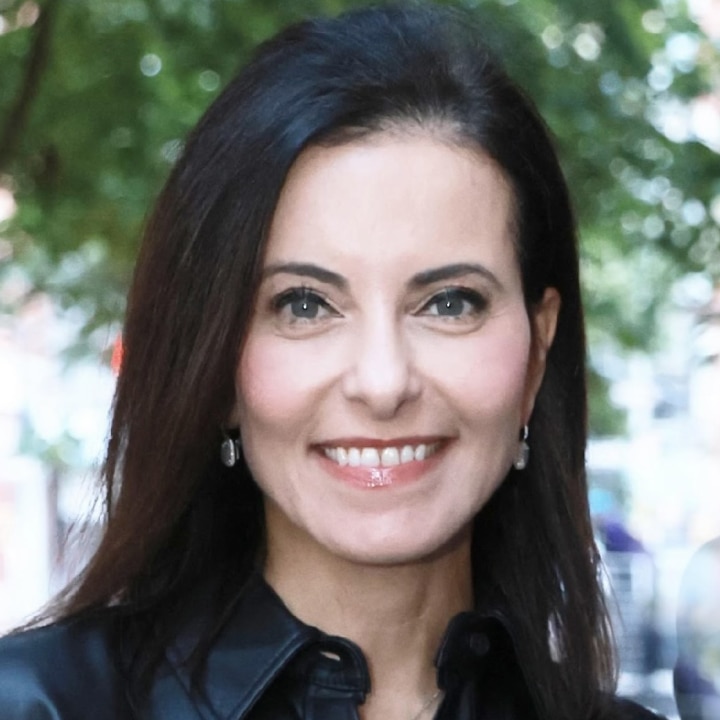 A professional headshot of Dina Powell McCormick.