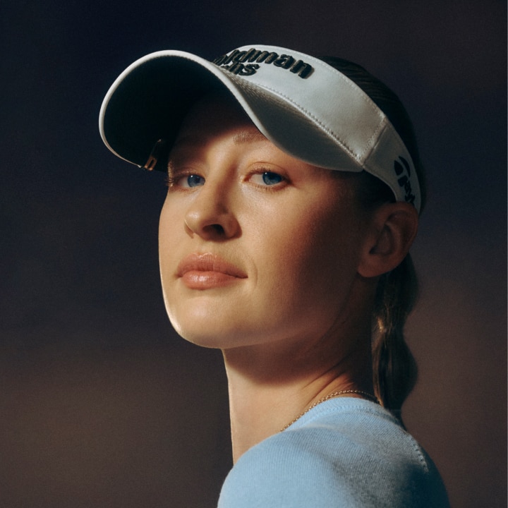 A professional headshot of Nelly Korda.