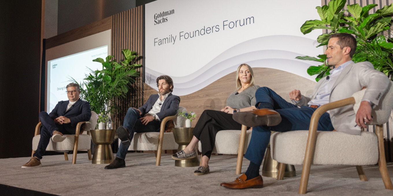 R.J. Melman, Jerrod Melman, Molly Melman, and Brian Grzelakowski seated on stage at the Family Founders Forum, engaging in a discussion on succession planning and multi-generational business strategies.