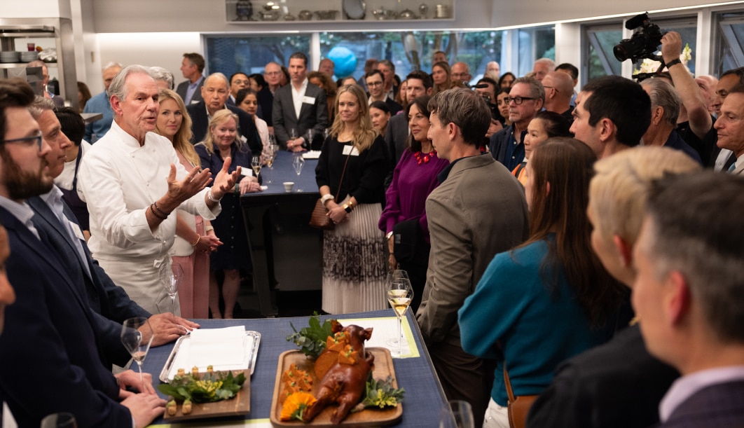 Chef Thomas Keller guiding a behind-the-scenes tour of The French Laundry. 