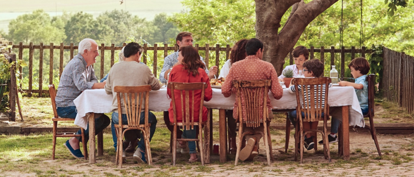 Family members in conversation about shared goals and legacy planning.