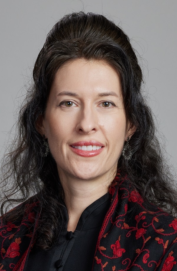 A professional headshot of Monica Heslington