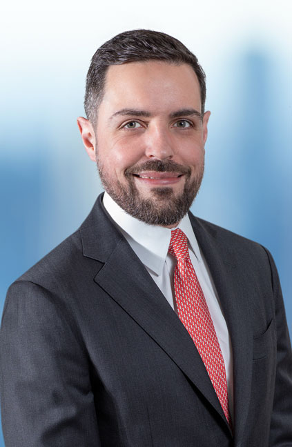 A professional headshot of Matheus Dibo
