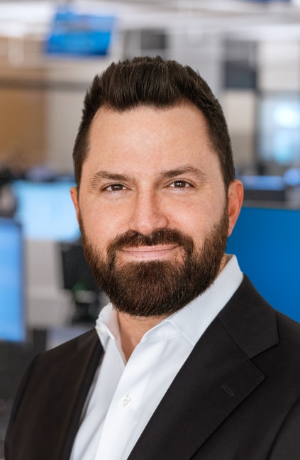 A professional headshot of Casey Plant