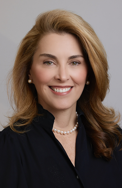 A professional headshot of Stacy Mullaney